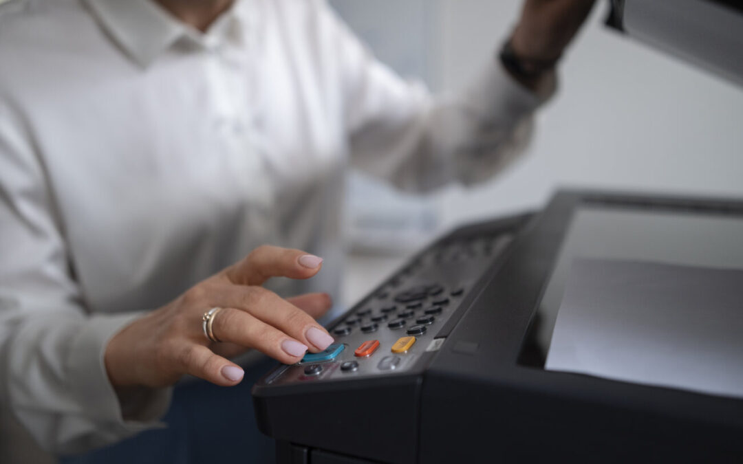 woman working on office using printers