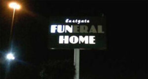 Old funeral home sign that needs to be refreshed so it doesn't say fun home